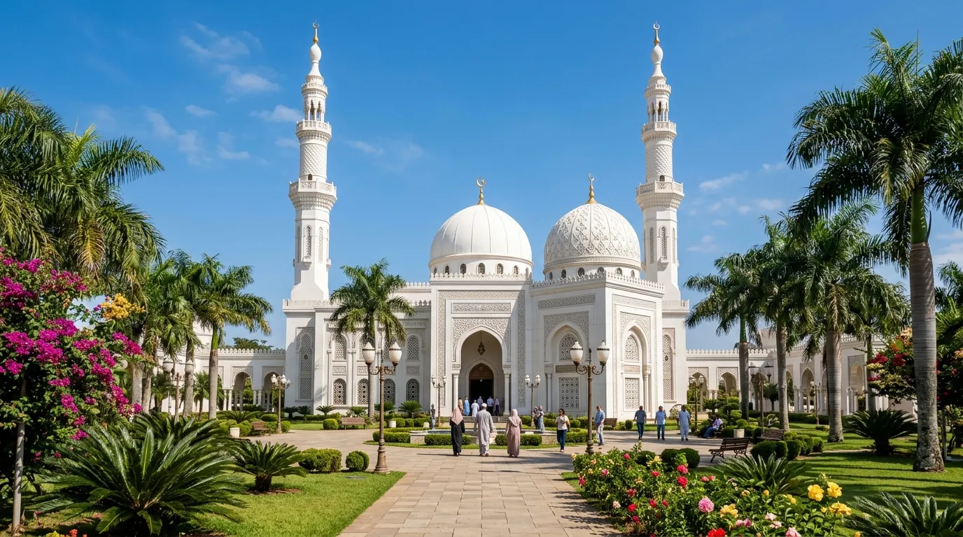 Striking white Islamic architecture of the Omar Ibn Al-Khattab Mosque with courtyard palms in Foz do Iguacu